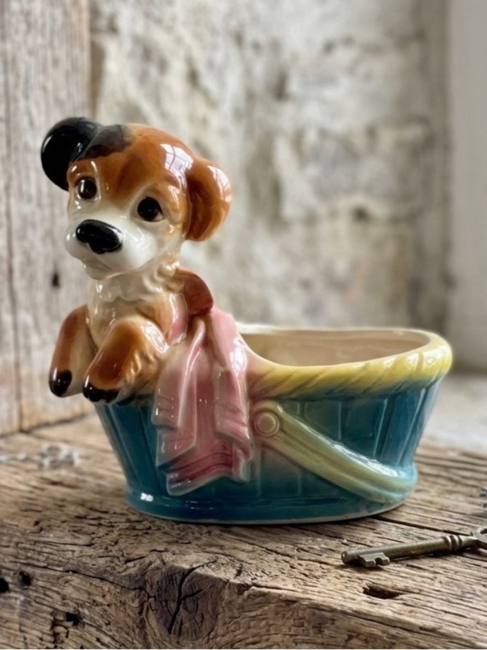 Royal Copley ceramic puppy-in-basket planter from the 1950s
Collectible